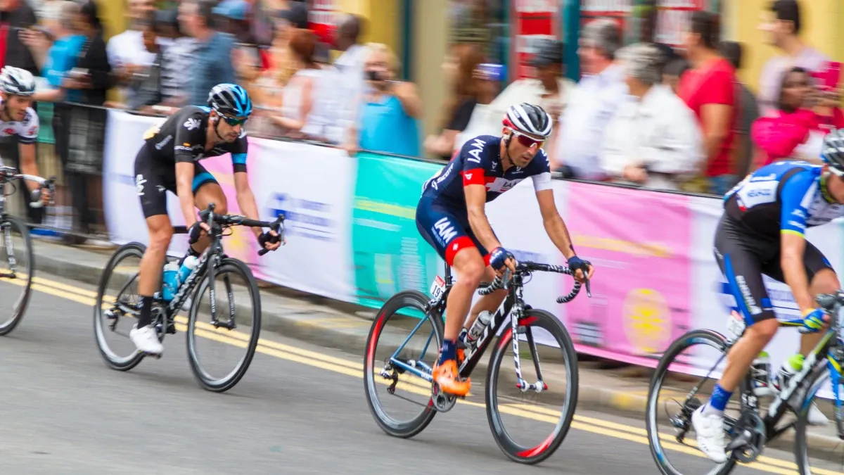 Tour de France cycling peloton with team kit sponsorship and roadside branding - World Sports Advertising