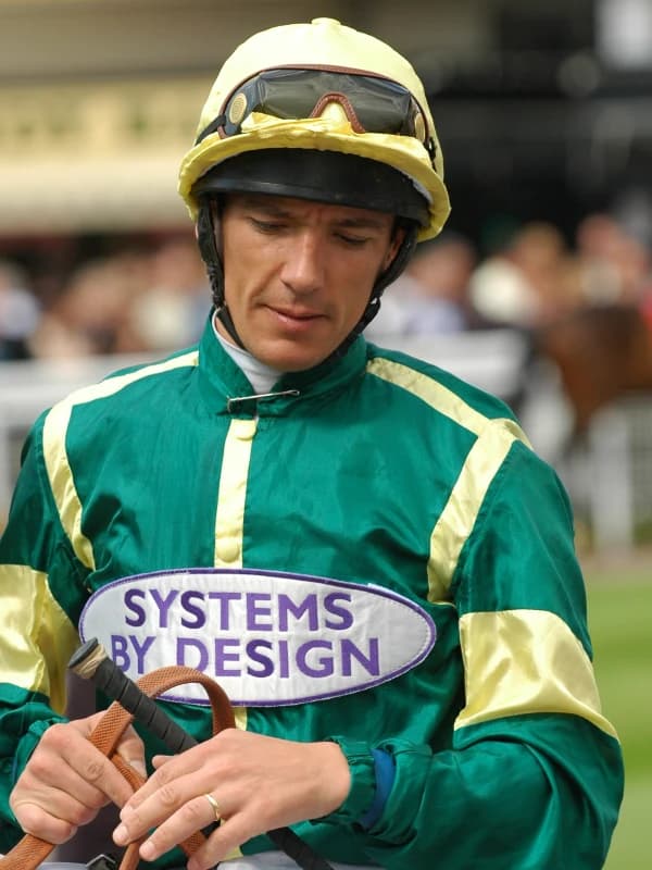 Frankie Dettori in elite horse racing action as a sports brand ambassador for World Sports Advertising
