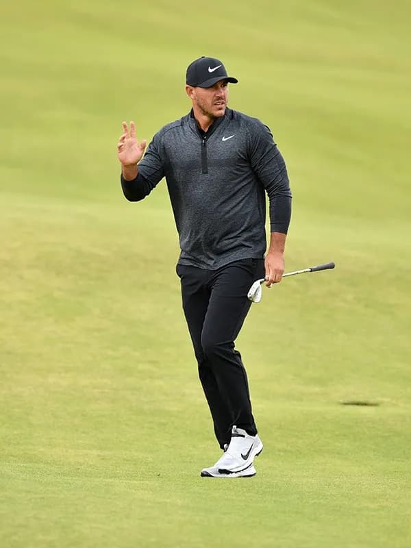 Brooks Koepka in elite golf action as a sports brand ambassador for World Sports Advertising