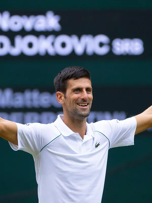 Novak Djokovic in elite tennis action as a sports brand ambassador for World Sports Advertising